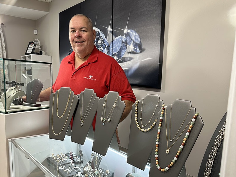 Don Walsh smiling at his counter