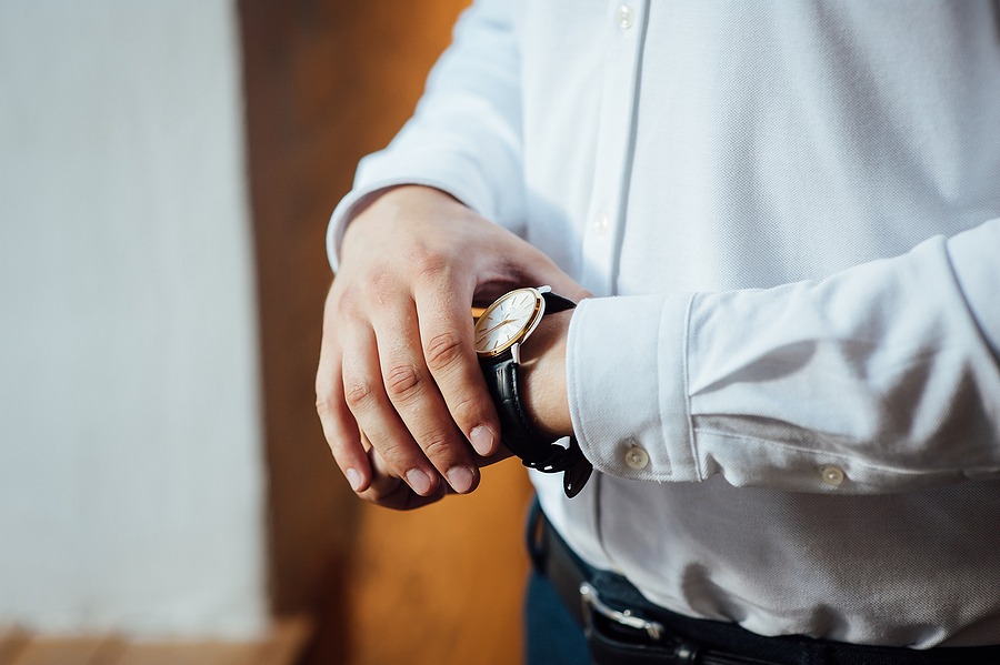 man wearing luxury watch